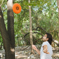 Frisbee Disco Volador 175 gramos para jugar al aire libre color naranja peso de 27.5 gramos